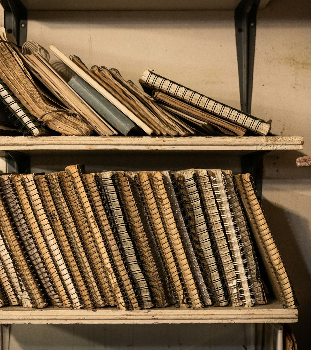 Shelves of old bound books
